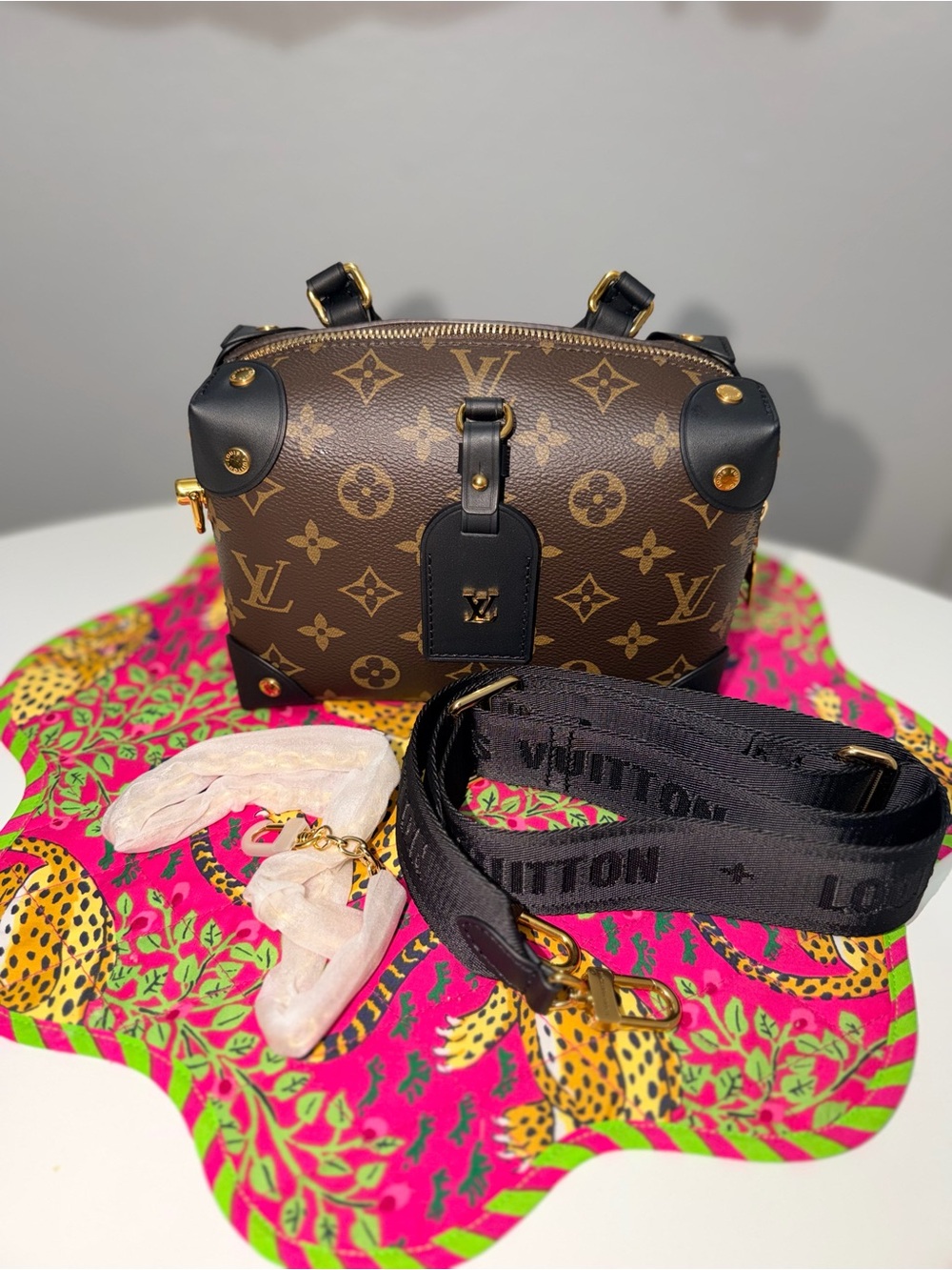 Monogram Petite Malle Souple Black crossbody bag